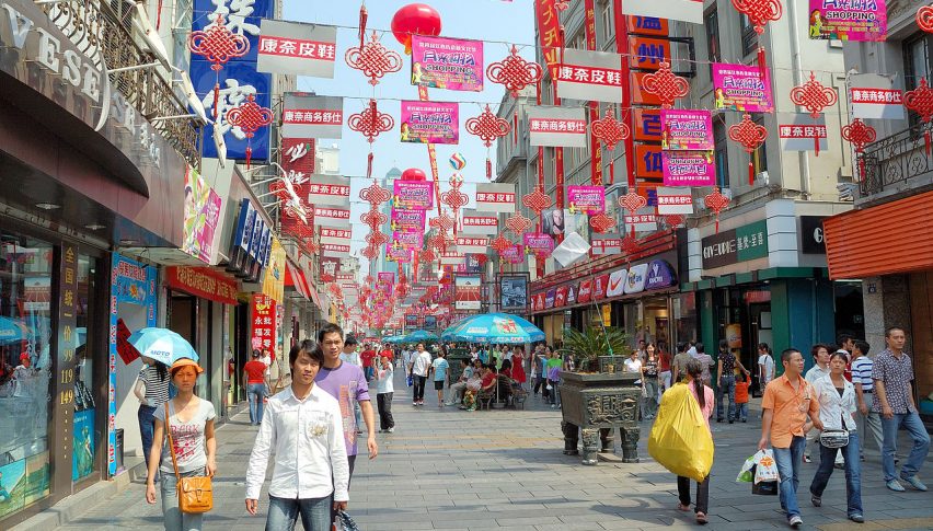 China's Industrial Output Growth Slows Down, Retail Sales Beats Forecast