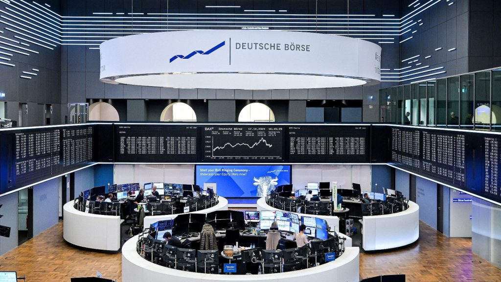 DAX trading floor with large screen in background