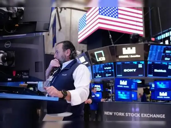 Dow Futures Boosted by Heavyweights Caterpillar, Apple, Cisco, and UnitedHealth